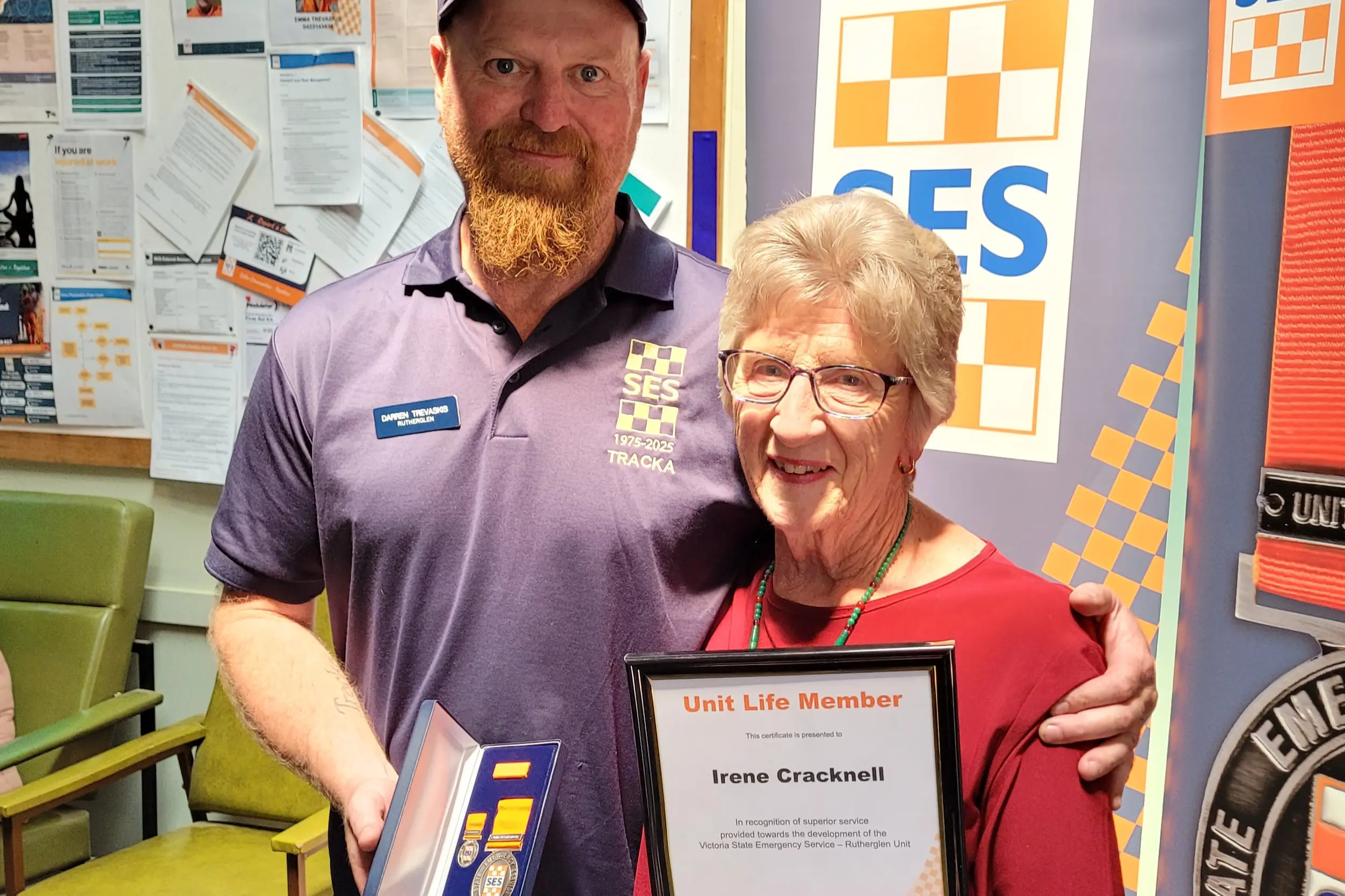 <p>PROUD: Rutherglen SES controller Darren Trevaskis and recently inducted VICSES life member of the Rutherglen Unit, Irene Cracknell at a special afternoon tea. PHOTO: Coral Cooksley</p>\\n