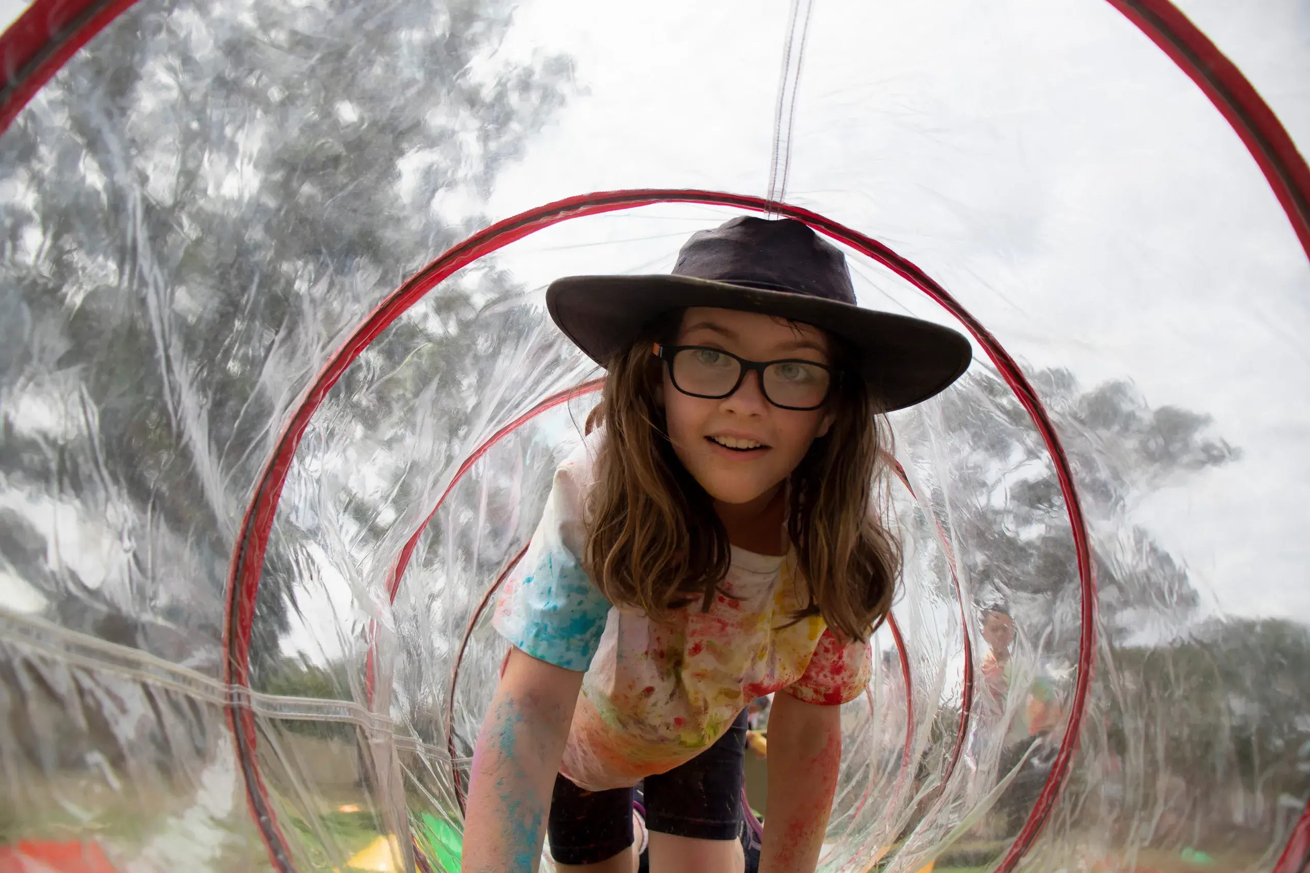 <p>RUNNING THE COLOUR GAUNTLET: Mila Wright, 9, tries to tunnel away from the mayhem that students from all of Euroa\\'s three schools got up to in ending the year on a fun-filled high, racing through their now infamous colour run. PHOTO: Dale Mann</p>\\n