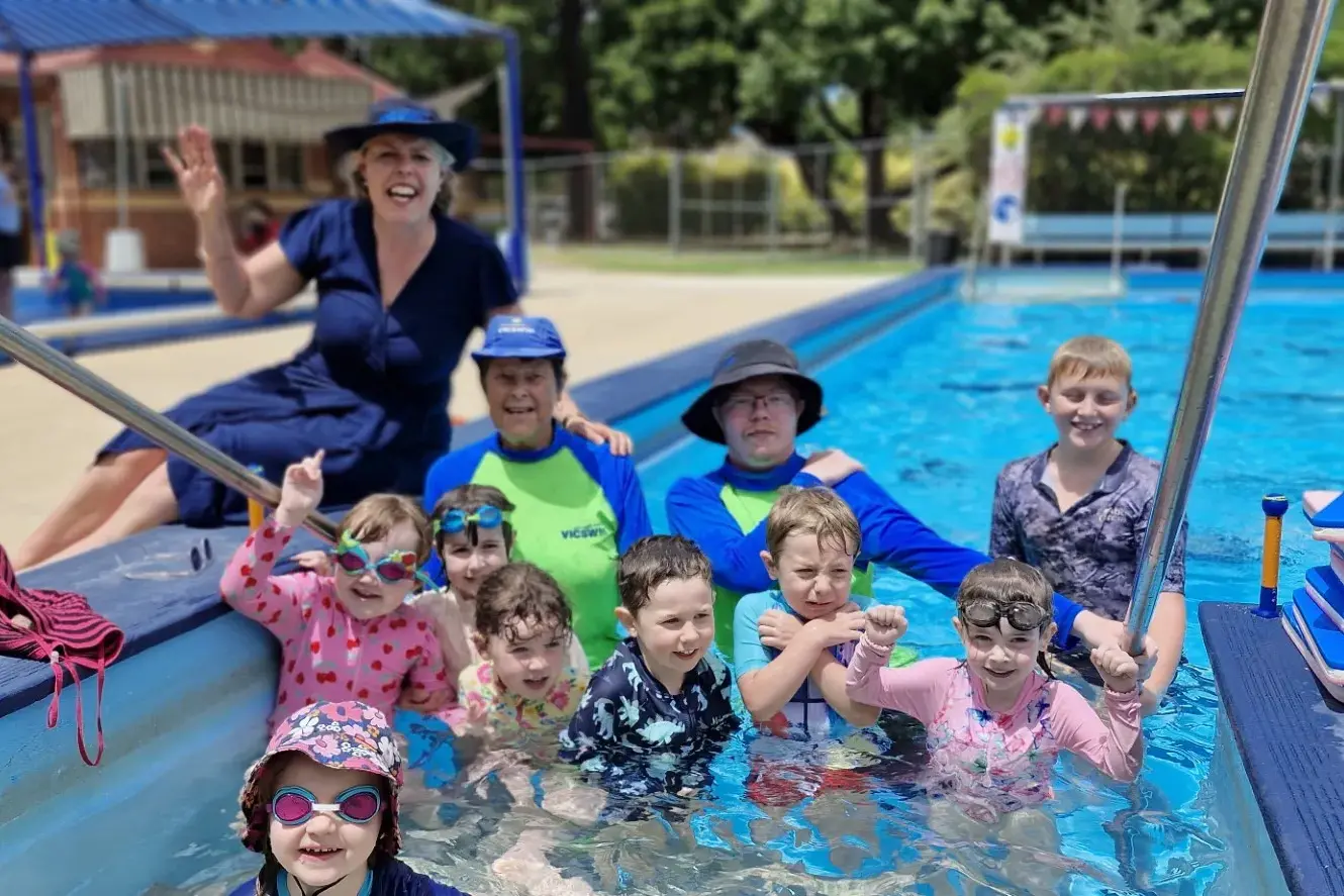 36 years swimming coach - Robbie Rae celebrates