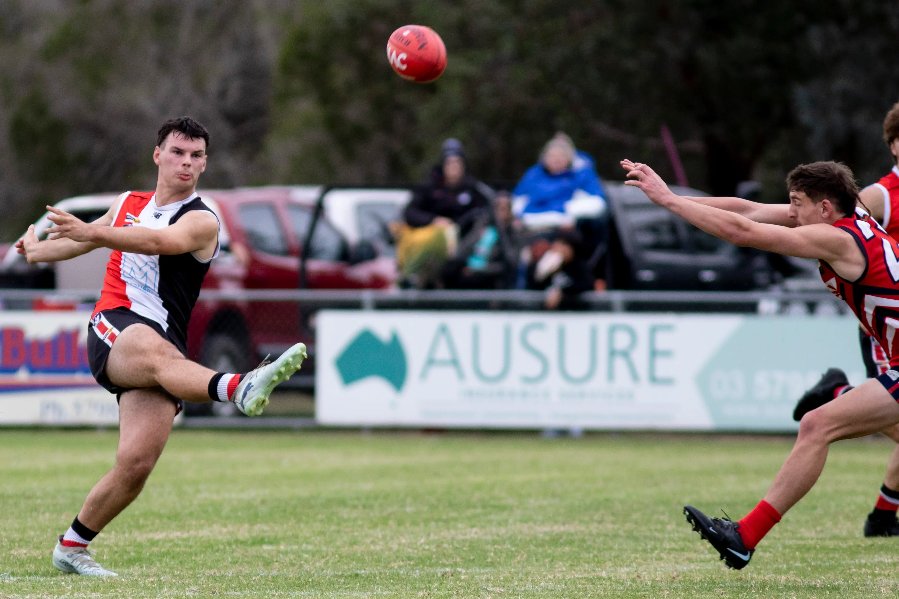 <p>GOES FROM DOWNTOWN: Archie Harrison backs himself and launches from long range. PHOTO: Dale Mann</p>\\n