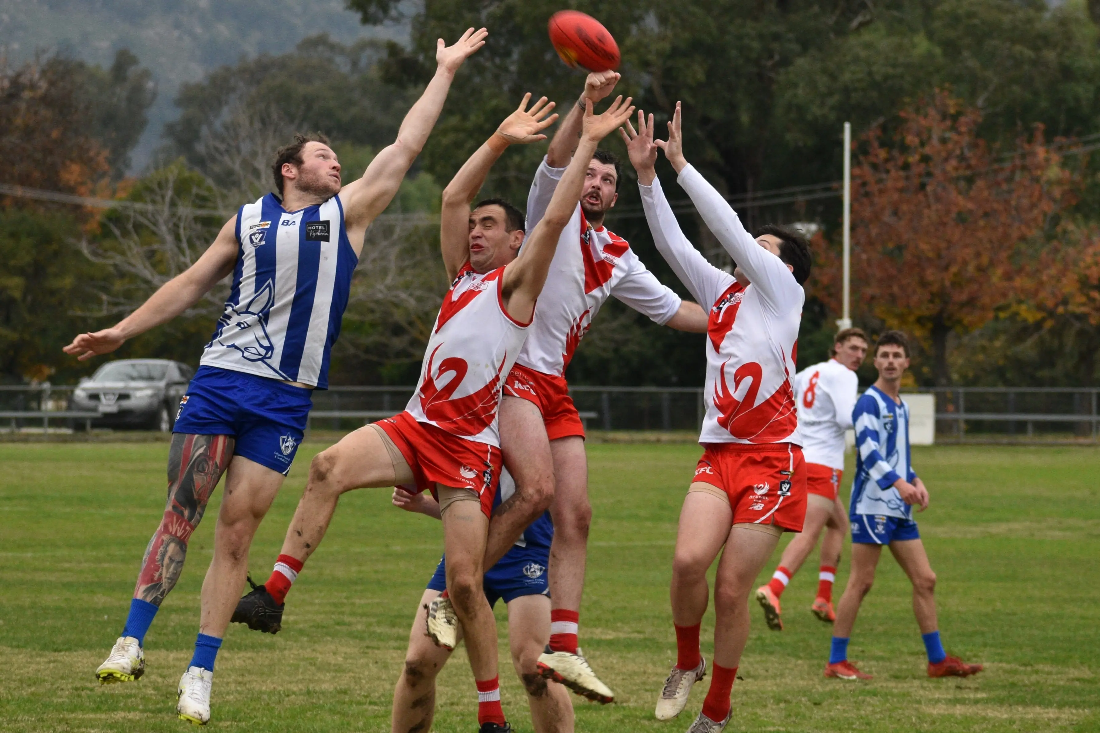 <p>DETERMINED BACKMEN: Benji Gillett leads the pack in defence while Nathan Torney gets his fist to the ball. PHOTO: Monica Crnko</p>\\n