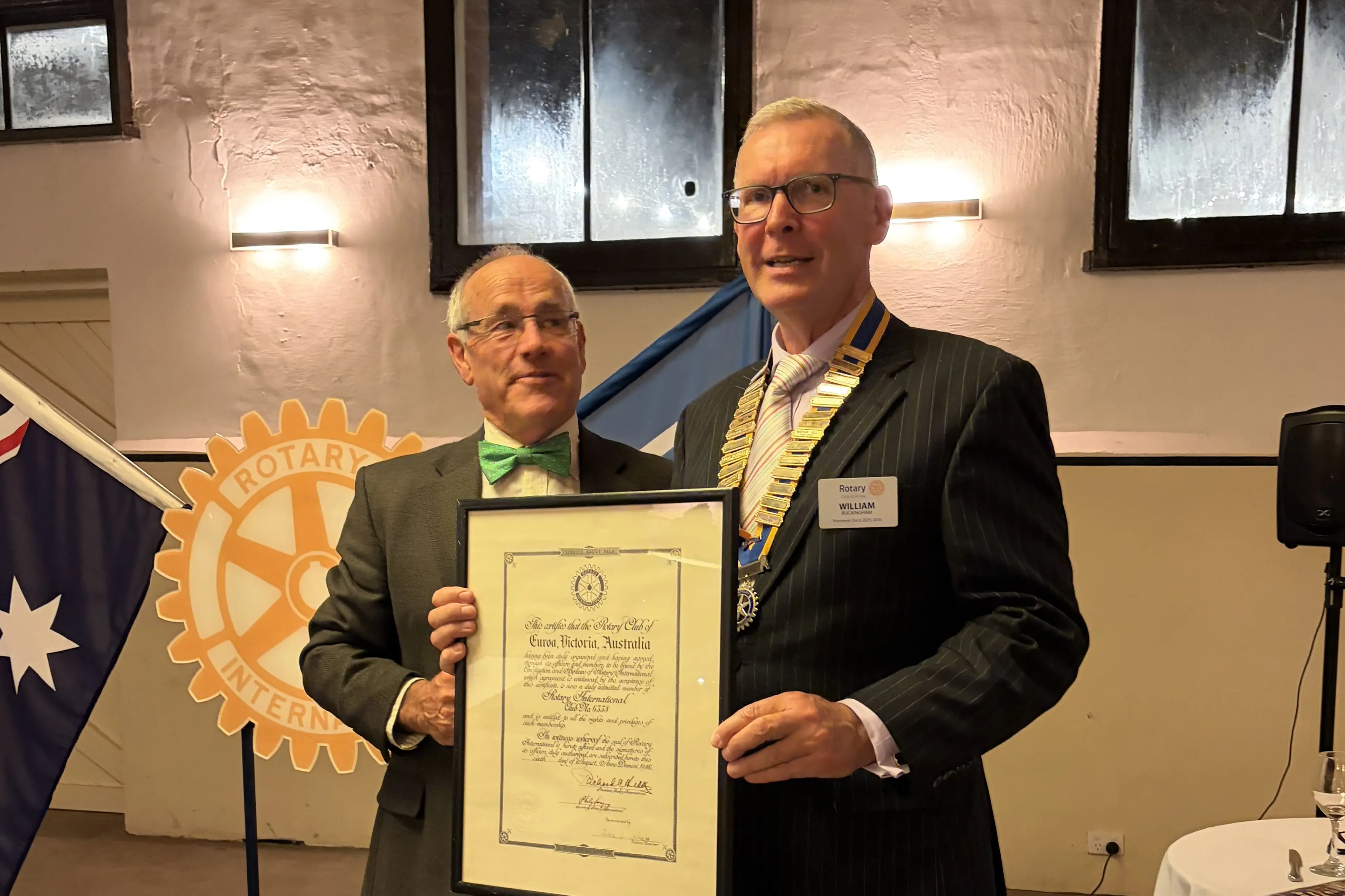 <p>REINS AND CHAINS: Outgoing president Michael Stubbe hands over the charter to William Buckingham on 19 June at the Butter factory in Euroa.</p>\\n