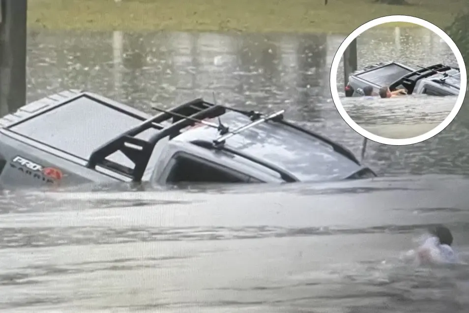 <p>\\'HE\\'S NOT GOING TO MAKE IT\\': Will Murray (bottom right) swims out to the stricken car where he was joined by another man (inset) and pulled the driver to safety with seconds to spare. IMAGE: ABC vision</p>\\n