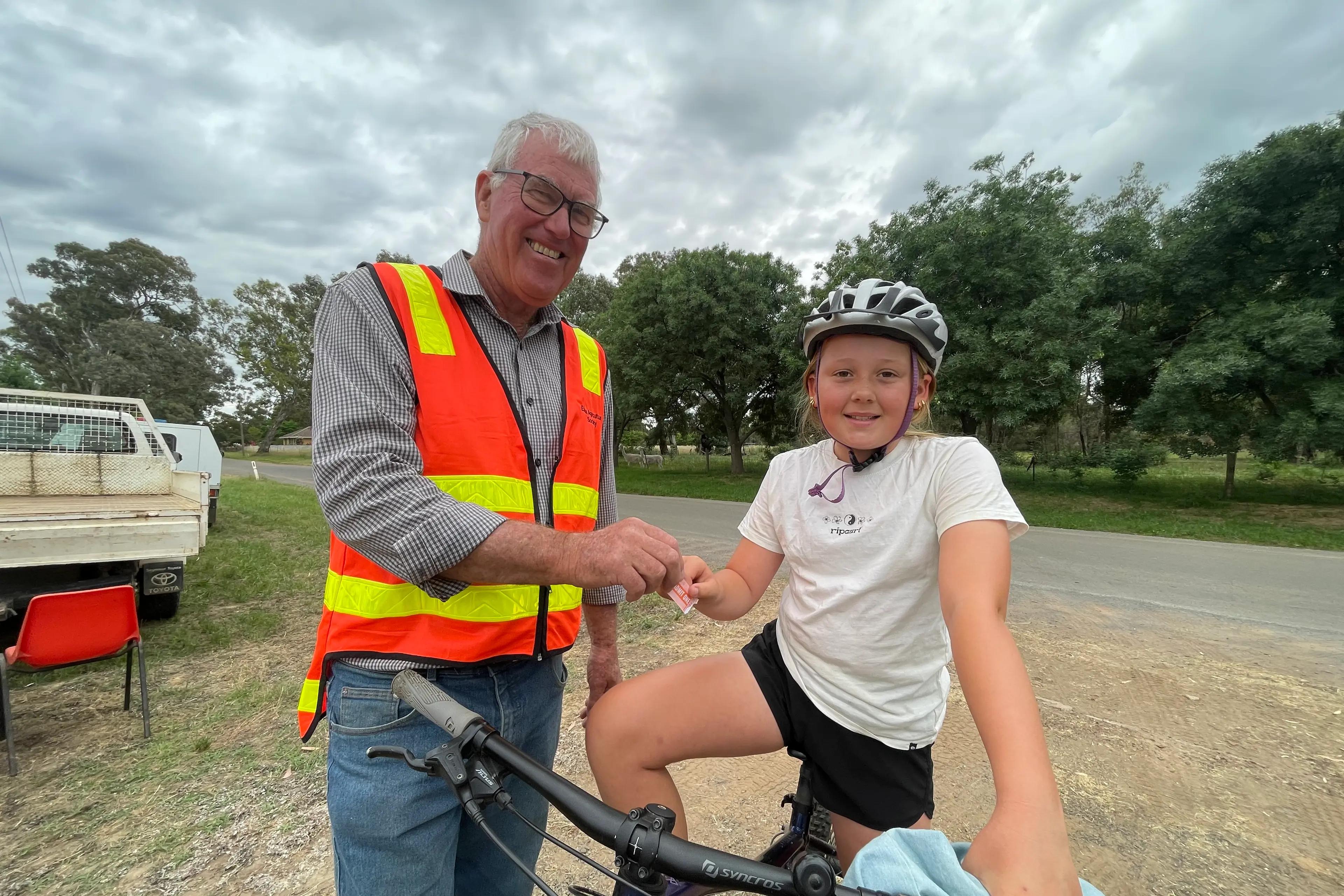 <p>TICKET TO RIDE: Richard Naughton did not need to give parking instructions to Ella when she arrived on her bicycle this morning at the Euroa Ag\\' Show. PHOTO: Andy Wilson</p>\\n
